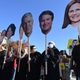 Abortion rights activists carry cutouts of Supreme Court Justices as people gather outside the Supreme Court as it prepares to hear a case out of Mississippi that could challenge the law on abortions in December 2021. The case could overturn the landmark abortion case of Roe v. Wade.
